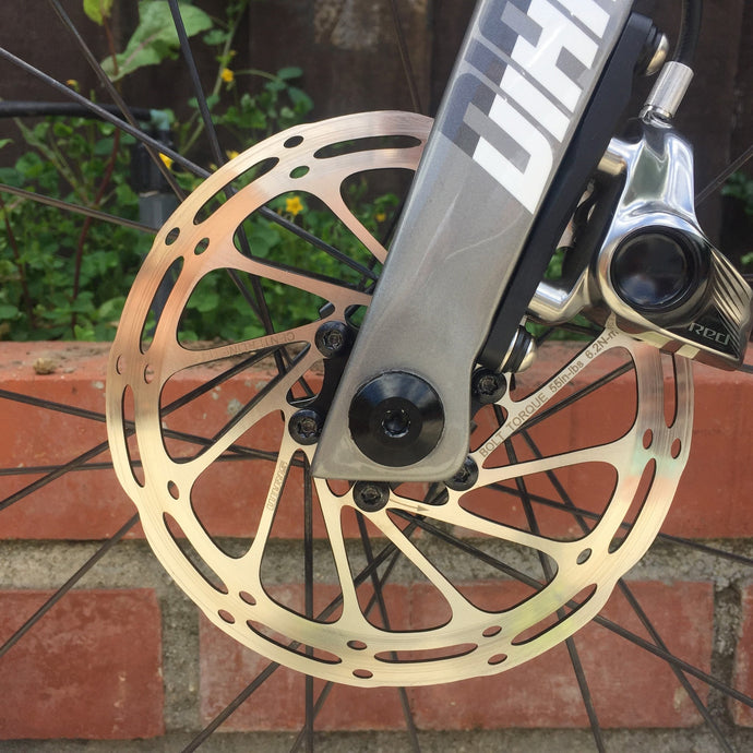 Do thru-axles and disc brakes have a place on triathlon bikes?